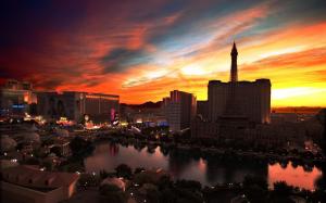 City night view, Las Vegas, casino, buildings, lights, sunset, red sky wallpaper thumb