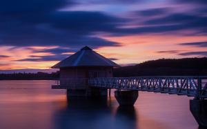 Sunset scenery, lake, house, bridge, purple sky wallpaper thumb