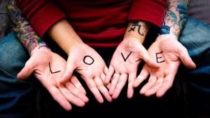 Stunning HD Photo of LOVE Word in Hand wallpaper thumb