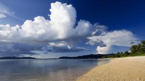 Clouds Over A Lone Beach wallpaper thumb