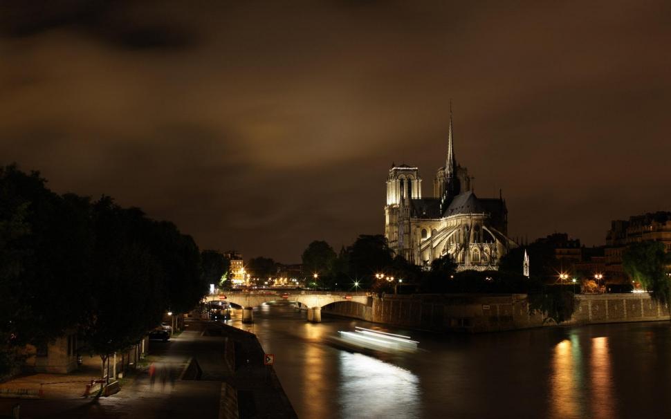 Fantastic Night View Of Notre Dame Cathedral wallpaper,river HD wallpaper,cathedral HD wallpaper,bridge HD wallpaper,night HD wallpaper,clouds HD wallpaper,nature & landscapes HD wallpaper,1920x1200 wallpaper