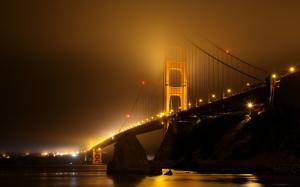 Golden Gate Bridge Bridge San Francisco Fog Mist Night Lights Rock Stone Ocean HD wallpaper thumb