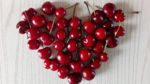 Red cherries, love hearts, fruit close-up wallpaper thumb
