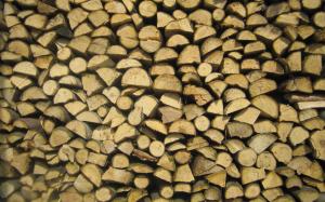 Pile of logs wallpaper thumb