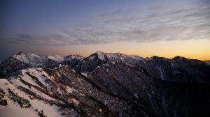 Winter sunset over mountains wallpaper thumb