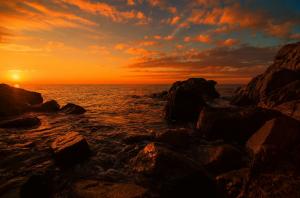 Sea rocks sunset wallpaper thumb