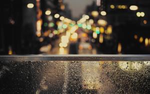 City lights beyond the rainy window wallpaper thumb