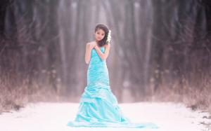 Blue dress girl, children, snow, bokeh wallpaper thumb