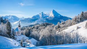 Winter, snow, mountains, trees, house, blue sky wallpaper thumb