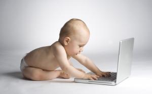 Cute baby learning with laptop computer wallpaper thumb