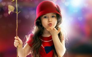 Cute little girl flying kiss wallpaper thumb