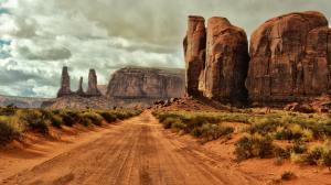 Monument Valley, Arizona, USA, road, gravel, rocks, bushes, clouds wallpaper thumb