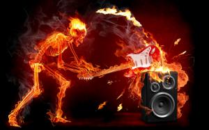 Skelet On Fire Smashing Guitar On Speaker wallpaper thumb