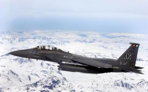 F 15E Strike Eagle flys over Glacial fields wallpaper thumb