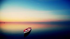 Rowboat on empty sea HD wallpaper thumb