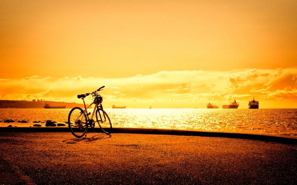 Parked Bicycle At Sunset wallpaper,bicycles HD wallpaper,ships HD wallpaper,pier HD wallpaper,sunset HD wallpaper,the sea HD wallpaper,nature & landscapes HD wallpaper,1920x1200 wallpaper