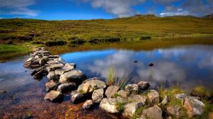 Scotland, dusk, hills, river, stones, clouds wallpaper thumb