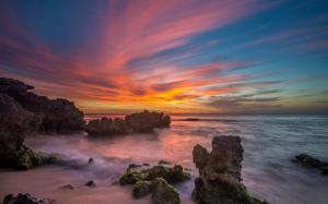 Ocean, rocks, sunset, clouds wallpaper thumb