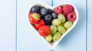 Fruits, heart shaped cup, strawberries, blueberries, grapes, raspberries wallpaper thumb