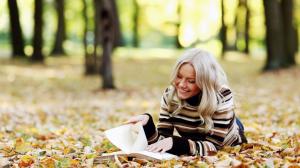 Autumn forest, girl read a book wallpaper thumb