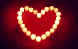 Warm and loving heart shaped candle wallpaper thumb