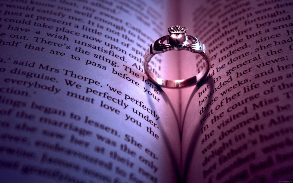 Shadow ring drawing a heart on a book wallpaper,heart HD wallpaper,love HD wallpaper,ring HD wallpaper,book HD wallpaper,2560x1600 wallpaper