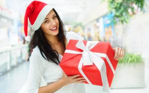 Smiling Christmas girl, gift box, ribbon wallpaper thumb