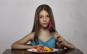 Girl eating flowers, vegetarian wallpaper thumb
