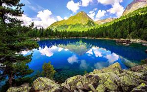 Lake, forest, mountains, rocks, trees, sky, clouds, nature scenery wallpaper thumb