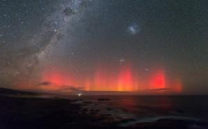 Aurora Borealis Northern Lights Night Stars Ocean Rocks Stones HD wallpaper thumb
