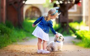 Cute little girl with dog wallpaper thumb