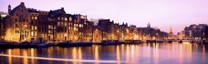 Illuminated, buildings, canal, night, Amsterdam, Netherlands wallpaper thumb