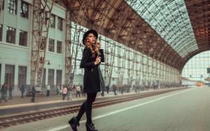 Girl at train station wallpaper thumb