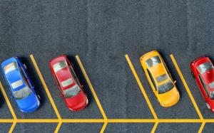 Parking area top view, pavement, yellow lines, yellow red blue cars wallpaper thumb
