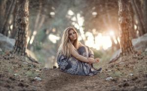 Girl sitting on the ground, forest, sunrise wallpaper thumb