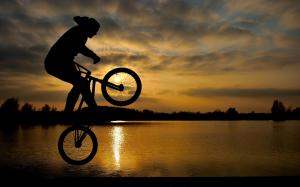 Bicycle Silhouette Sunset Lake Jump HD wallpaper thumb