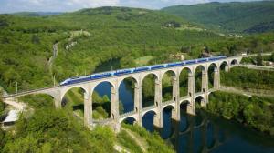 Super Train On Ancient Bridge In France wallpaper thumb