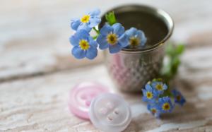Little blue flowers, buttons, cup wallpaper thumb