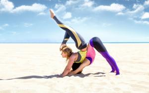 Yoga in sand wallpaper thumb