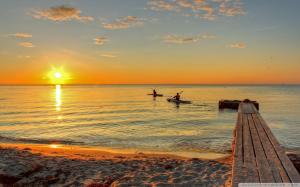 Kayaking To The Sunset wallpaper thumb