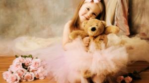 Cute girl with toy bear wallpaper thumb
