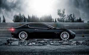 Maserati GranTurismo supercar in high speed running wallpaper thumb