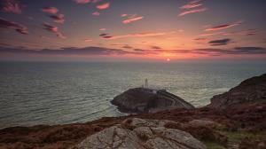 Lighthouse Ocean Coast Sunset Clouds HD wallpaper thumb