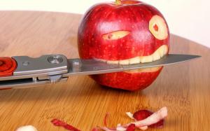 Funny Apple Knife wallpaper thumb