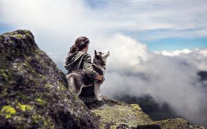 sky woman clouds girl rocks mountain dog stones adventure lookout husky wallpaper thumb