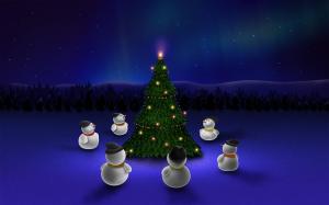 Snowmen around a Christmas tree wallpaper thumb