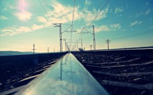 Railroad reflecting the electric wires wallpaper thumb