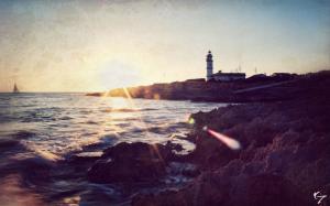 Lighthouse Coast Rocks Sun Sunlight Ocean HD wallpaper thumb
