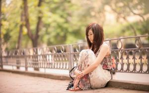 Sadness Asian girl, sit at street wallpaper thumb