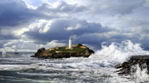Lighthouse On A Stormy Point wallpaper thumb